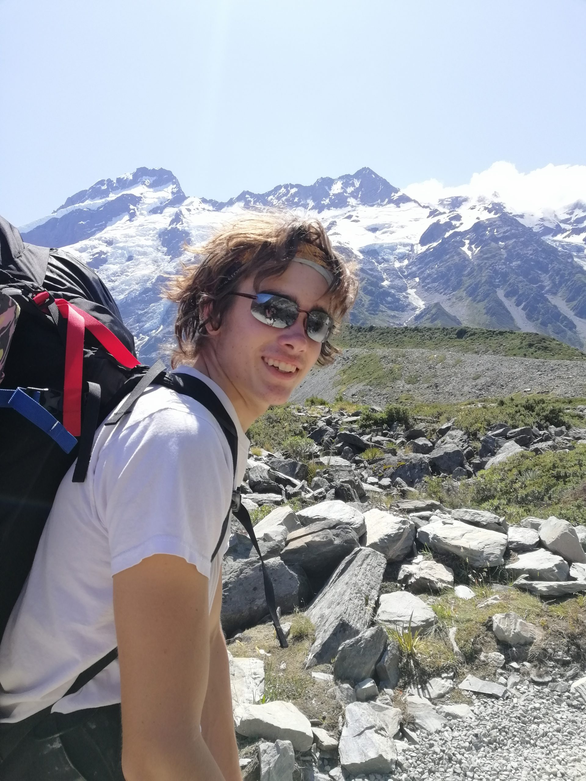 Photo of Ben Mitchell with Mt Sefton behind